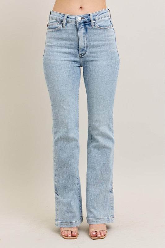 Light blue jeans on a plain background